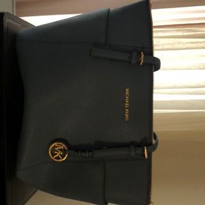 Blue Michael Kors jet set large saffiano bag